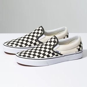 Black and White Vans Slip On’s